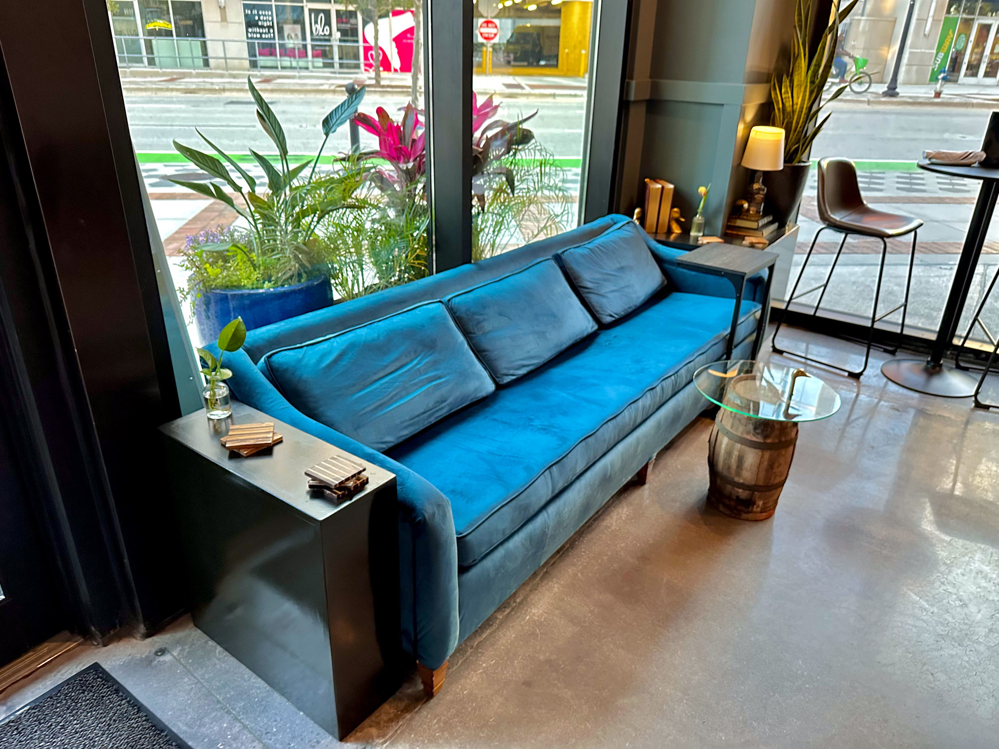 blue velvet couch in restaurant